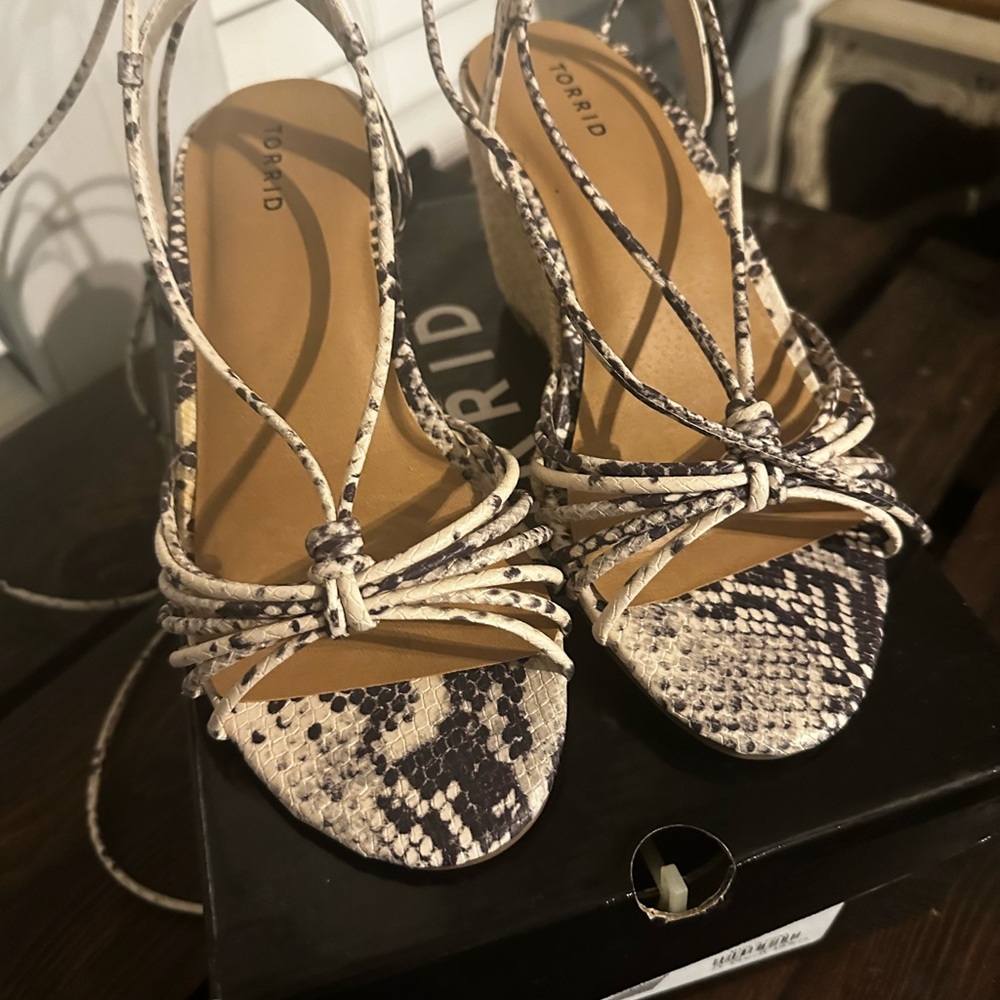 Torrid 7.5 wide snake print lace up cork wedge never worn.